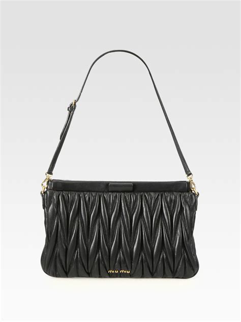 miu miu matelasse clutch|Black Matelassé Leather Clutch .